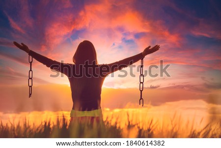 Woman feeling free in a beautiful natural setting.