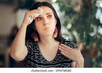 Woman Feeling Hot During Summer Wiping Her Forehead. Sweaty Person Feeling Overheated And Dehydrated During Sunny Day
