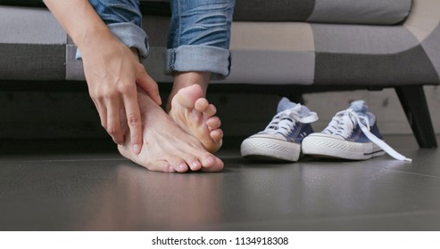 Woman Feeling Pain On Her Toe