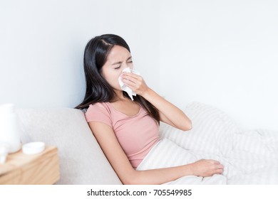 Woman Feeling Sick On Bed