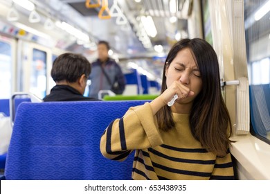 Woman Feeling Sick In Train Compartment