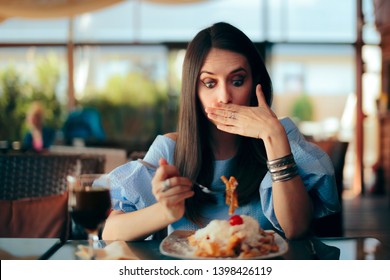 Woman Feeling Sick While Eating Huge Meal. Person Experiencing Overeating Side Effects At Lunch
