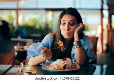 Woman Feeling Sick While Eating Huge Meal. Person experiencing overeating side effects at lunch
