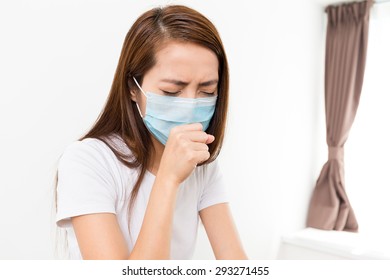 Woman Feeling Unwell At Home