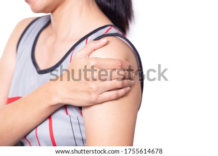 woman feels arm or elbow pain on white background , healthy and medical concept 