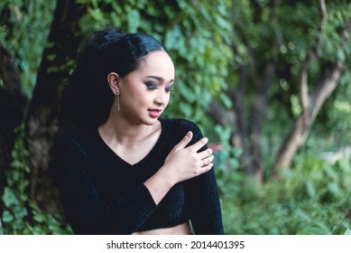 A Woman Feels The Throbbing Ache On Her Shoulder, The Side Effect Of A Second Dose COVID-19 Vaccine Injection.