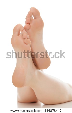 Woman feet over white