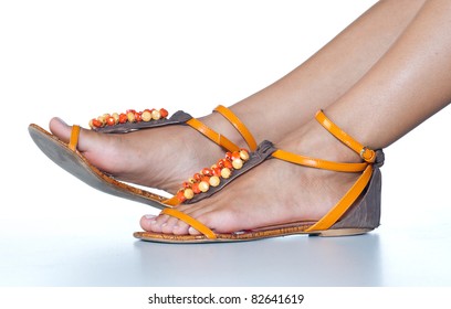 Woman Feet In Summer Sandals Shoes