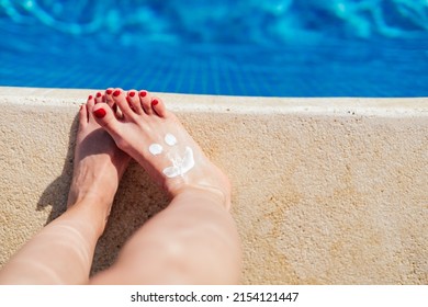 Woman Feet With A Sunscreen Smile, View From Above, Copyspace, Legs Blurred, Selective Focus