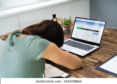 Woman Fell Asleep White Waiting For Slow Download On Laptop