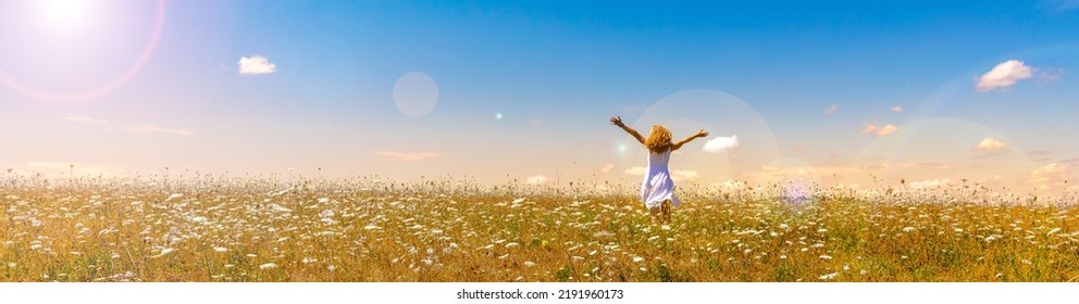 Woman In A Field With Flowers- Freedom,  Active,  Happiness Concept