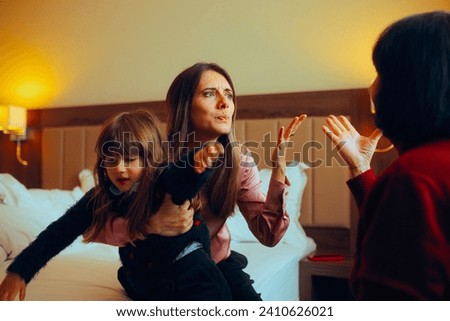 
Woman Fighting with her Mother in Law about Raising her Child. Mother and daughter conflict about parenting values in front of the toddler 
 Сток-фото © 