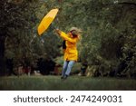 
Woman Fighting Wind Blow During a Rainstorm Tempest. Strong windy bad weather being dangerous and risky
