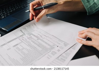 Woman Filling US Tax Form 1040. Tax Form Us Business Income Office Hand Fill Concept. Closeup