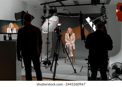 A woman at film studio set. Behind the scenes - Powered by Shutterstock