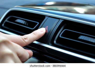 Woman Finger Hitting Car Emergency Light Botton, Man Pressing Red Triangle Car Hazard Warning Button