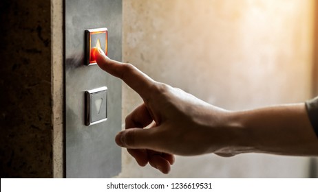 Woman Finger Presses The Elevator Up Button Upper High Level Floor.