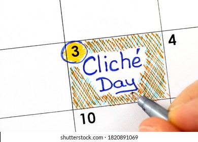 Woman fingers with pen writing reminder Cliche Day in calendar. November 3.  - Shutterstock ID 1820891069