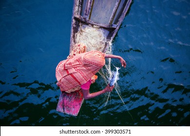 Woman Fishing, Bangladesh