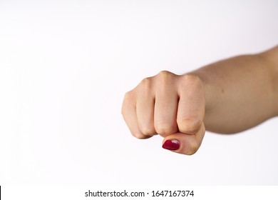 Woman fist isolated on white background.