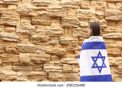 Woman With The Flag Of Israel Near The Wailing Wall