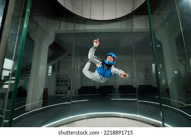 A Woman Flies In A Wind Tunnel. Free Fall Simulator.