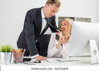 Woman flirting with her co-worker