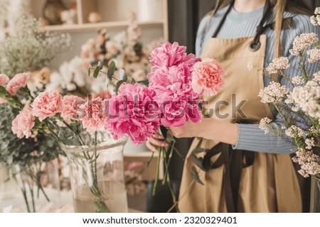 Similar – Image, Stock Photo Unrecognizable young woman crafting with paper and scissors
