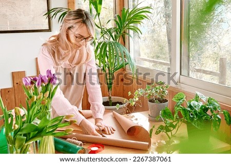 Similar – Image, Stock Photo Girl stiring coffee and looking her tablet