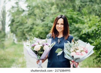 Woman Florist With Two Delicate Bouquets Of Different Flowers As Gift In Boutiques Of Designer Bouquets And Premium Flowers. Flower Delivery And Love. Birthday Flower Delivery Best Gift For Woman.