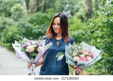 Woman Florist With Two Delicate Bouquets Of Different Flowers As Gift In Boutiques Of Designer Bouquets And Premium Flowers. Flower Delivery And Love. Birthday Flower Delivery Best Gift For Woman.