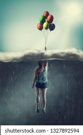 Woman flying with balloons through a rainy cloud to the sunny sky. The concept of overcoming fears.