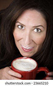 Woman With Foam From Coffee Specialty Drink On Her Lip And Nose