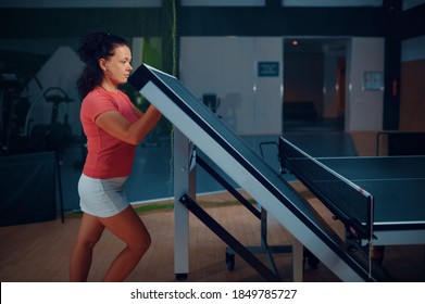 Woman Folds Ping Pong Table, Tennis Workout