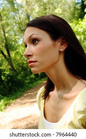 Woman In Forest With Vacant Stare