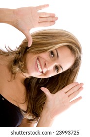 woman framing her face with her hands isolated over a white background