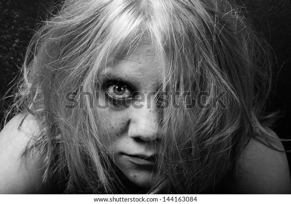 Woman Freckles Tousled Hair Stares Straight Stock Photo Edit Now