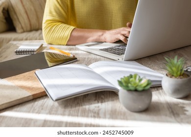 Woman With Freelance Work At Desk Table Using Office Supplies And Laptop, Preparing Product Launch, Presentation, Planning, Strategy And Development Of New Business. - Powered by Shutterstock