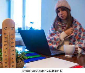 Woman Freezes While Working In Office; Cold At Home; Cold At Work; Gas Crisis 2022; Winter 2022; Blackout; No Heating; Heating Problems In Europe; Home Office