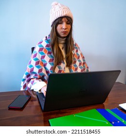 Woman Freezes While Working In Office; Cold At Home; Cold At Work; Gas Crisis 2022; Winter 2022; Blackout; No Heating; Heating Problems In Europe; Home Office