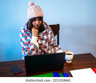 Woman Freezes While Working In Office; Cold At Home; Cold At Work; Gas Crisis 2022; Winter 2022; Blackout; No Heating; Heating Problems In Europe; Home Office