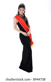 Woman Friendly Smile Of A Pageant Queen Wearing Red Sash