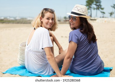 Woman Friends On The Beach