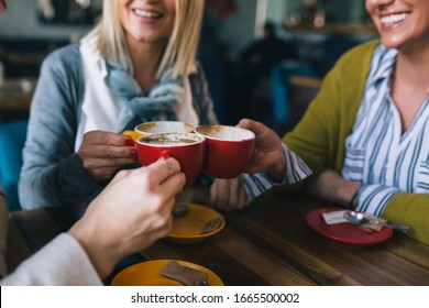 Woman Friends On Coffee Break At Cafe, Cheers With Coffee