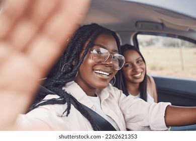 Woman, friends and smile for road trip selfie, journey or holiday adventure together in the car. Happy women smiling for photo memories or social media in vehicle travel, transport or vacation break - Powered by Shutterstock