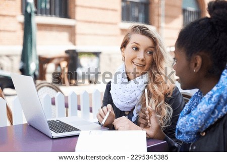 Woman, friends and studying in collaboration for assignment, project or higher education in the city. Student women working together to study, sharing ideas or work on group project in an urban town ストックフォト © 