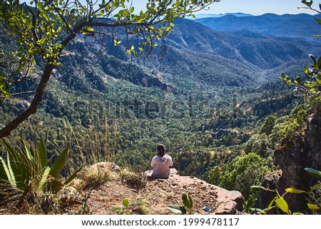 woman in front of mountains, sierra madre occidental, durango , mexico