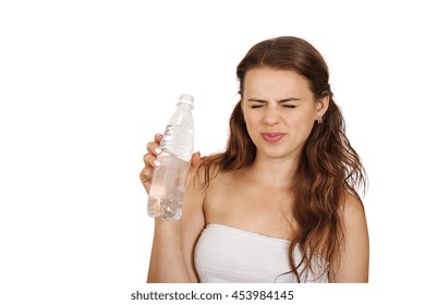 Woman Frown On Bad Water From A Bottle