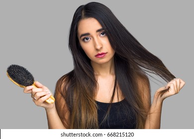 Woman Frustrated With Unmanageable Hair, Tangled And Dry Frizzy Damaged Flat Hairstyle With Dead Ends