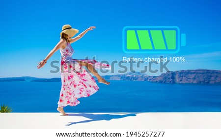 Woman with fully charged inner battery, concept of taking a break and recharging yourself Foto stock © 